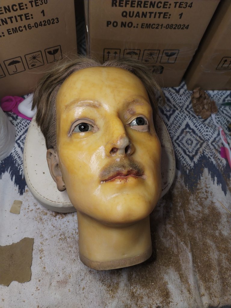 restauration tête en cire