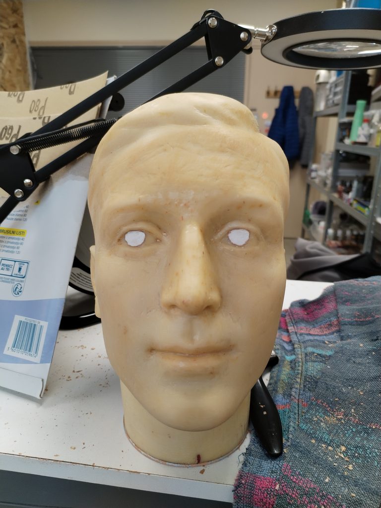 restauration tête en cire